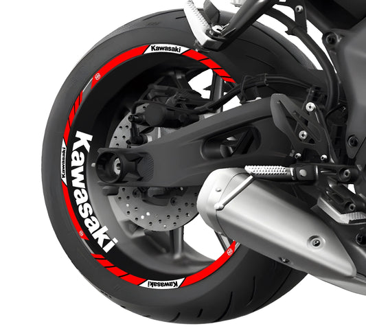 Motorcycle wheel with Kawasaki branding and orange accents on a white background.